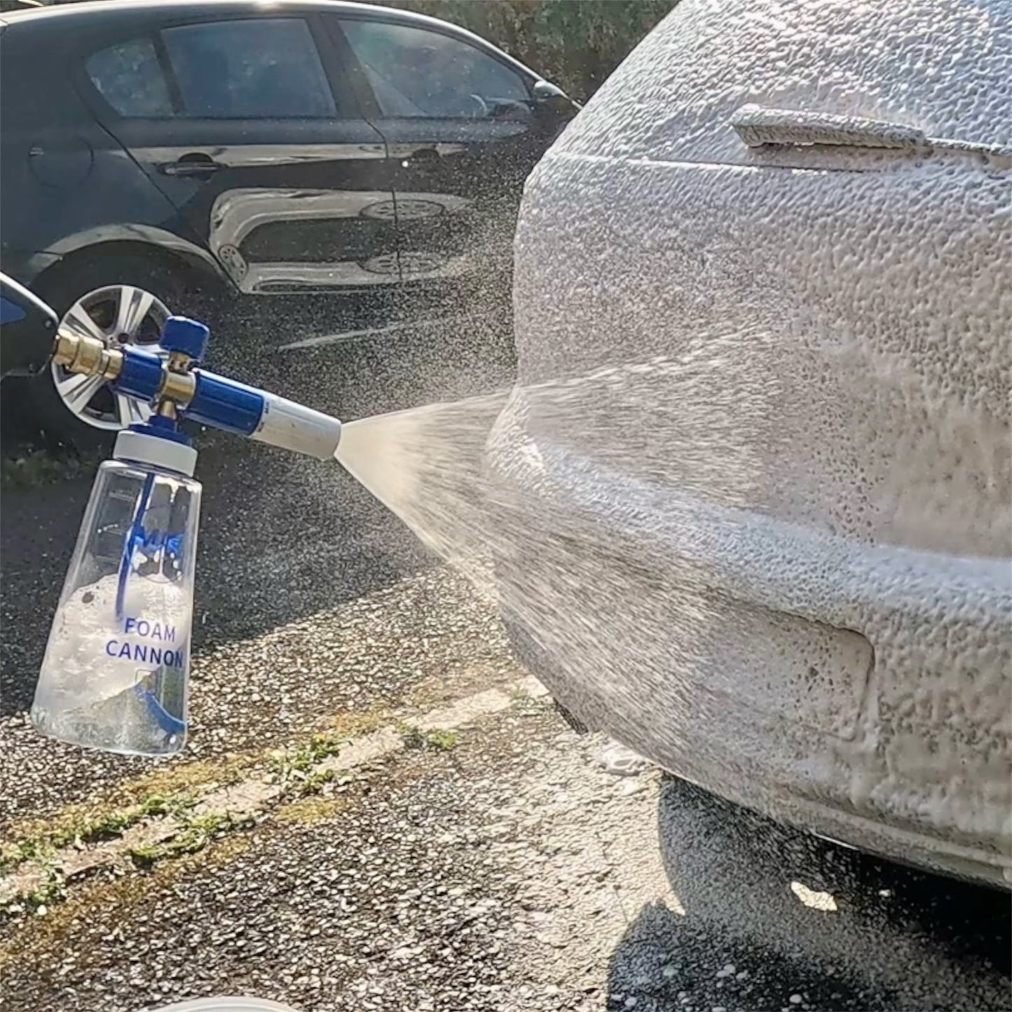 Pure snow foam sprayed on car