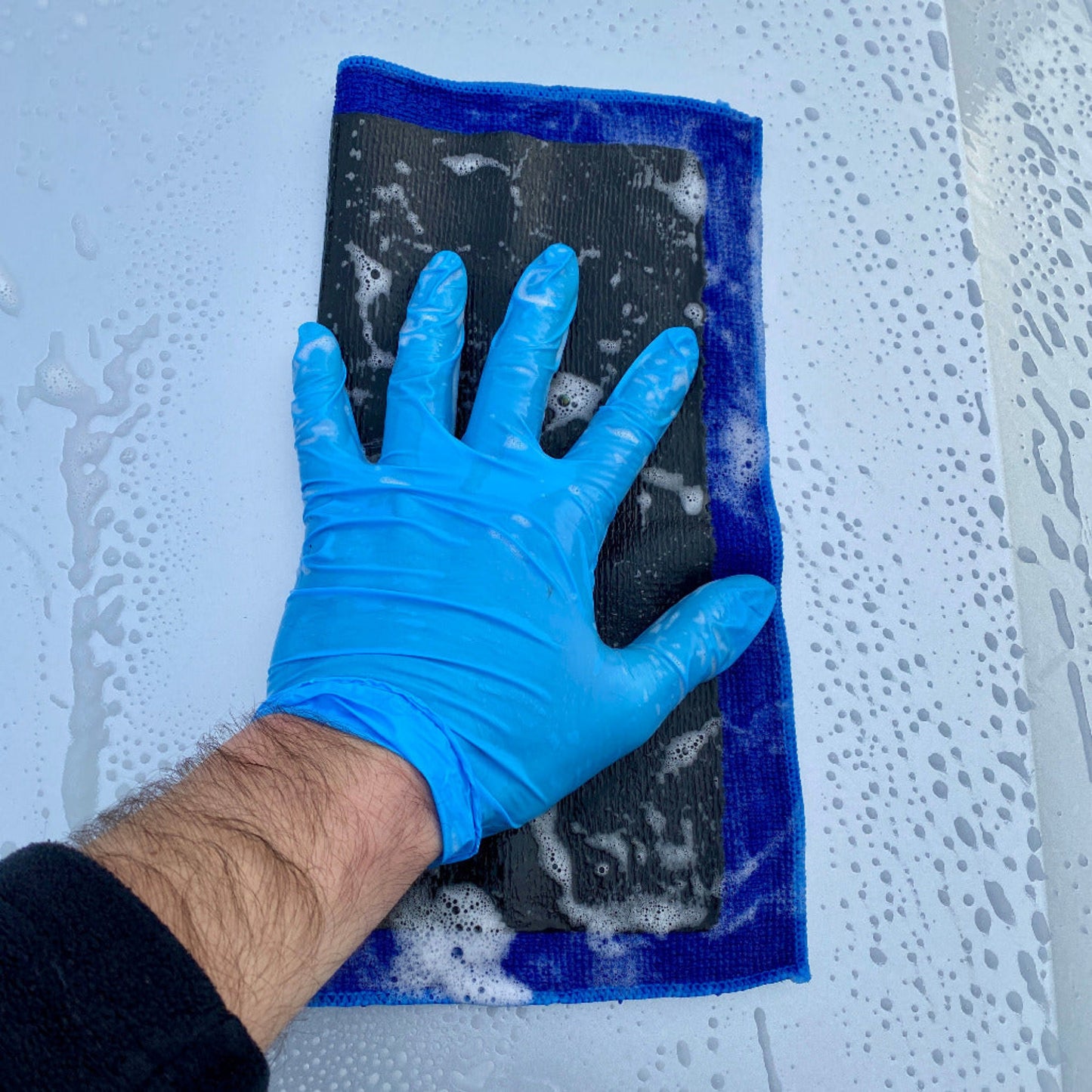 medium grade clay towel on car paint